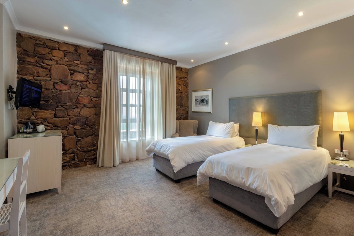 Standard Room, 2 Single Beds | 1 bedroom, down duvets, in-room safe, individually decorated