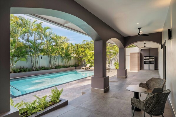 Outdoor pool, open 8:00 AM to 7:00 PM, sun loungers