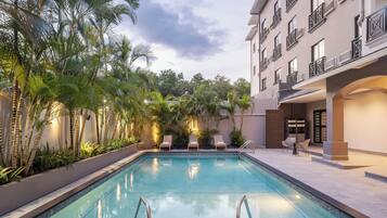 Outdoor pool, open 8:00 AM to 7:00 PM, sun loungers