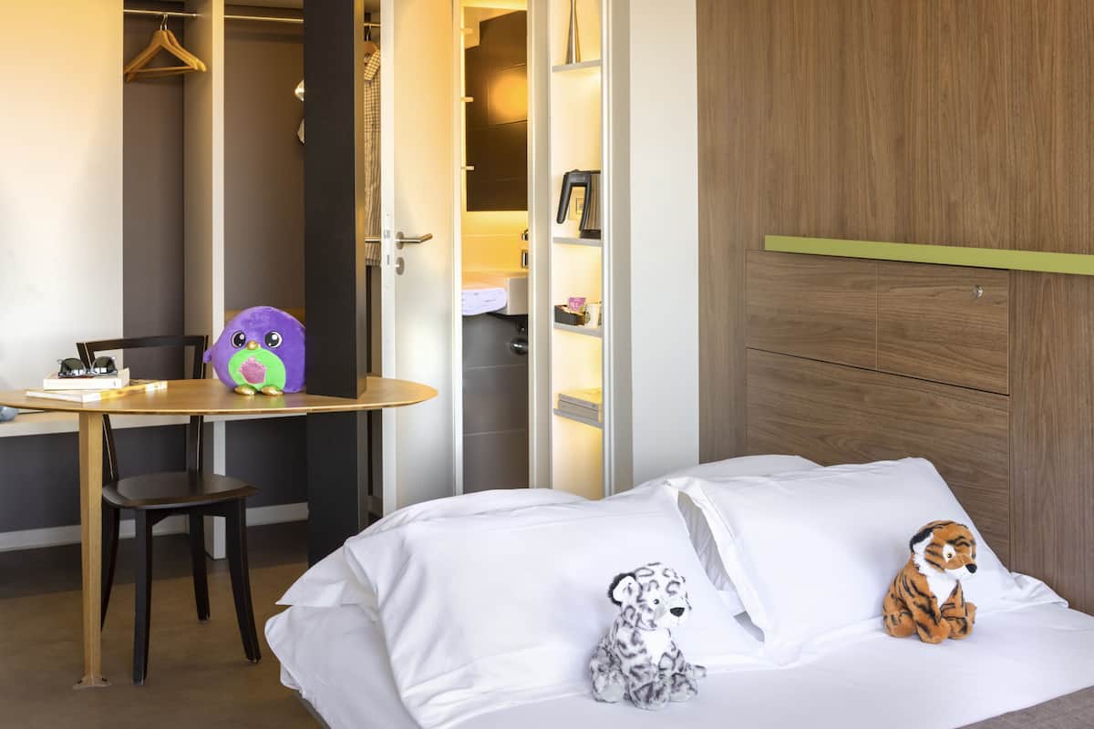 duplex room | premium bedding, laptop workspace, blackout curtains, soundproofing