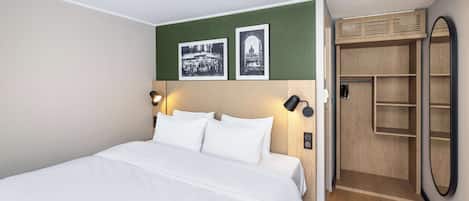 Premium bedding, desk, blackout drapes, iron/ironing board