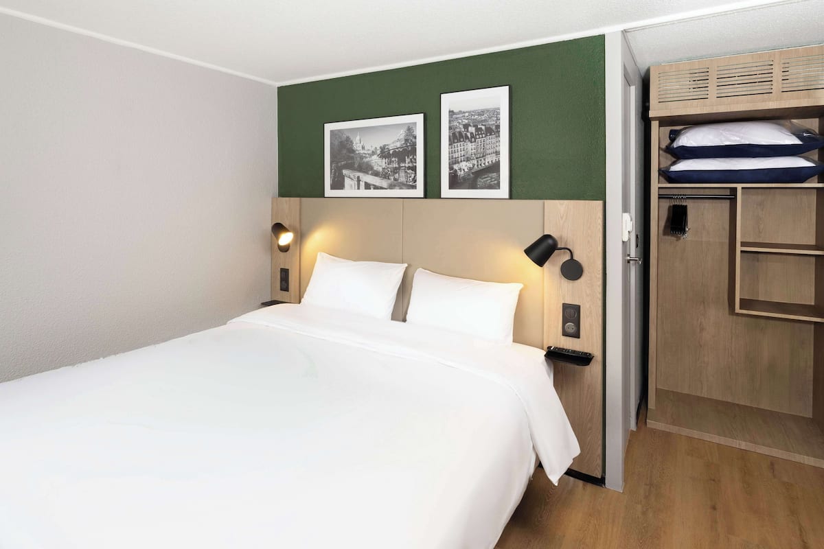 Premium bedding, desk, blackout curtains, iron/ironing board