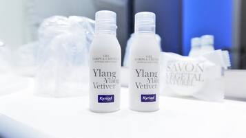 Premium bedding, desk, laptop workspace, iron/ironing board