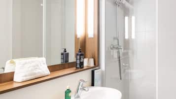 Shower, eco-friendly toiletries, towels, soap