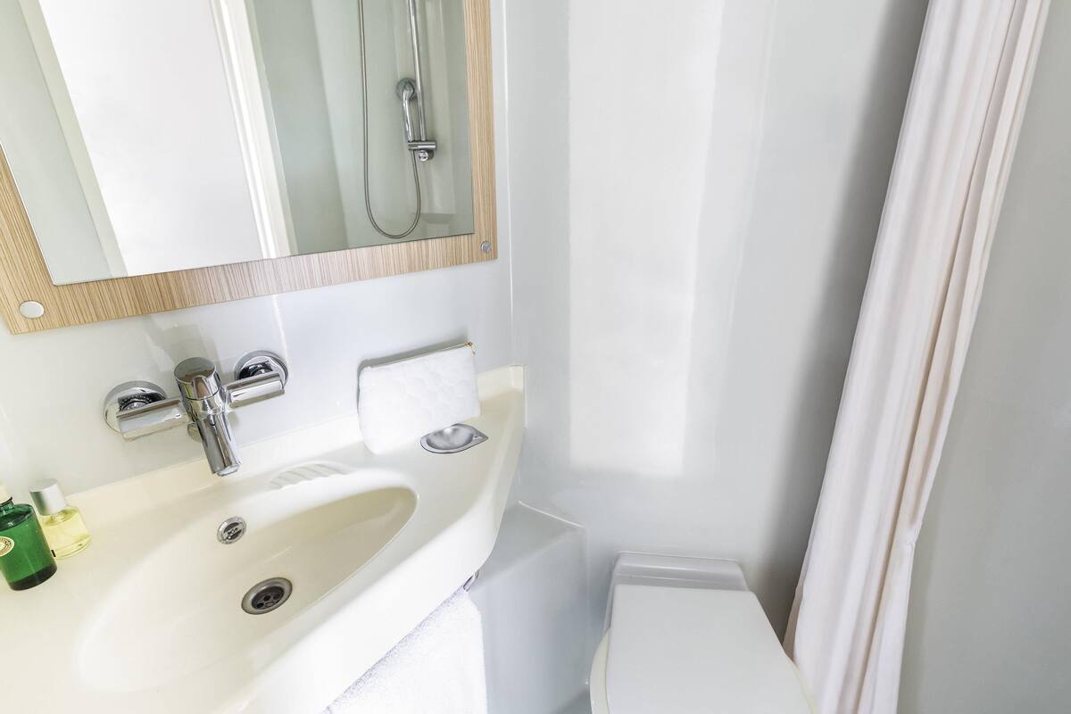 Desk, blackout curtains, soundproofing, iron/ironing board