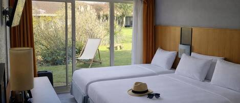 Premium bedding, desk, blackout curtains, soundproofing