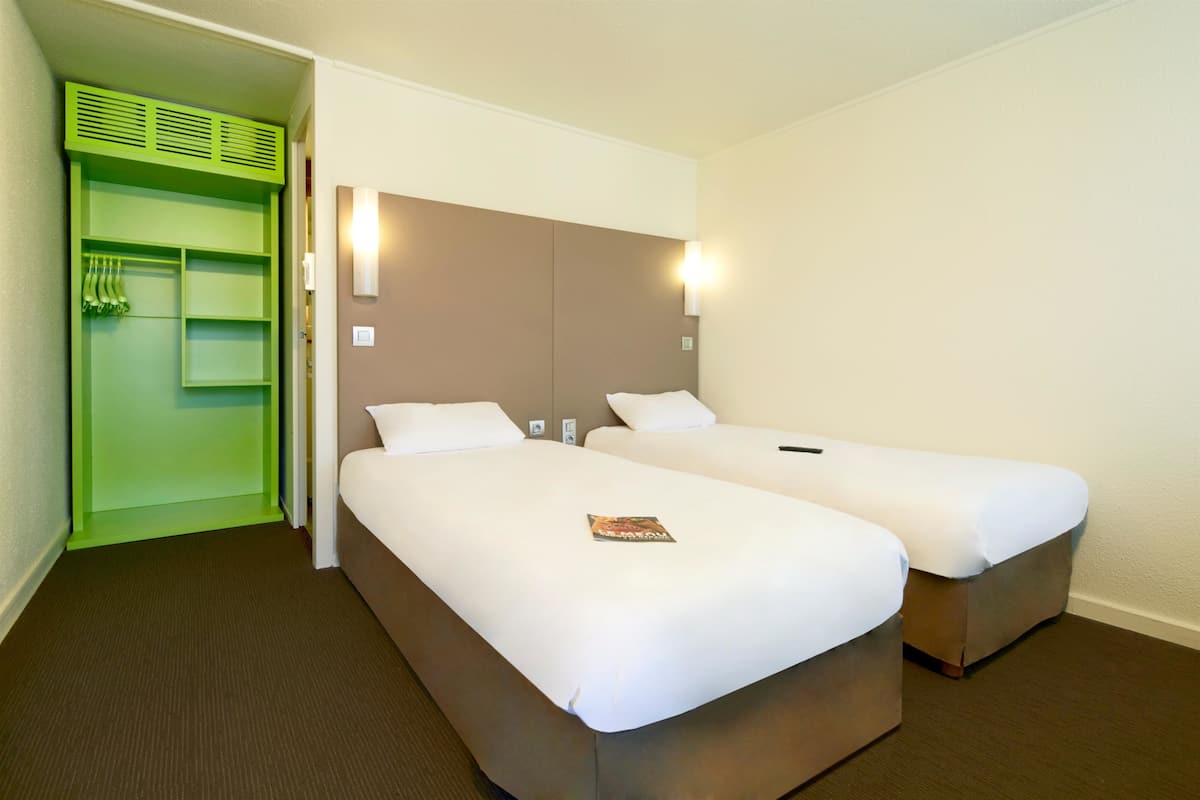 Premium bedding, desk, blackout curtains, iron/ironing board