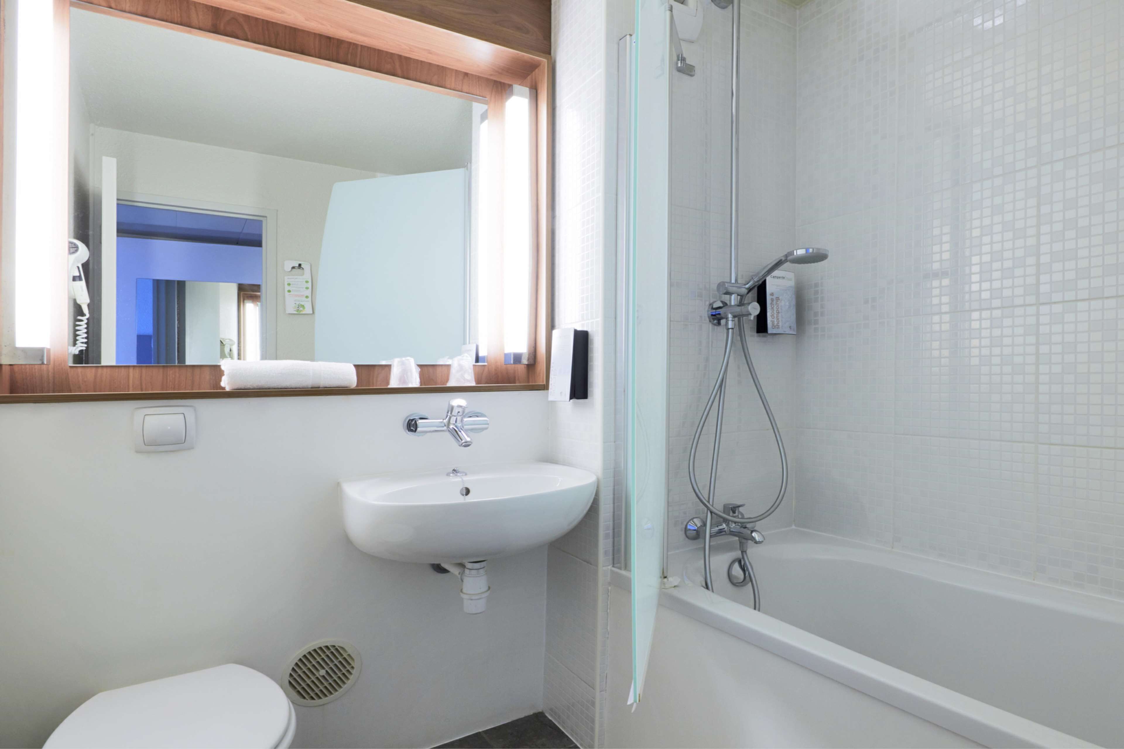 shower, eco-friendly toiletries, hair dryer, towels