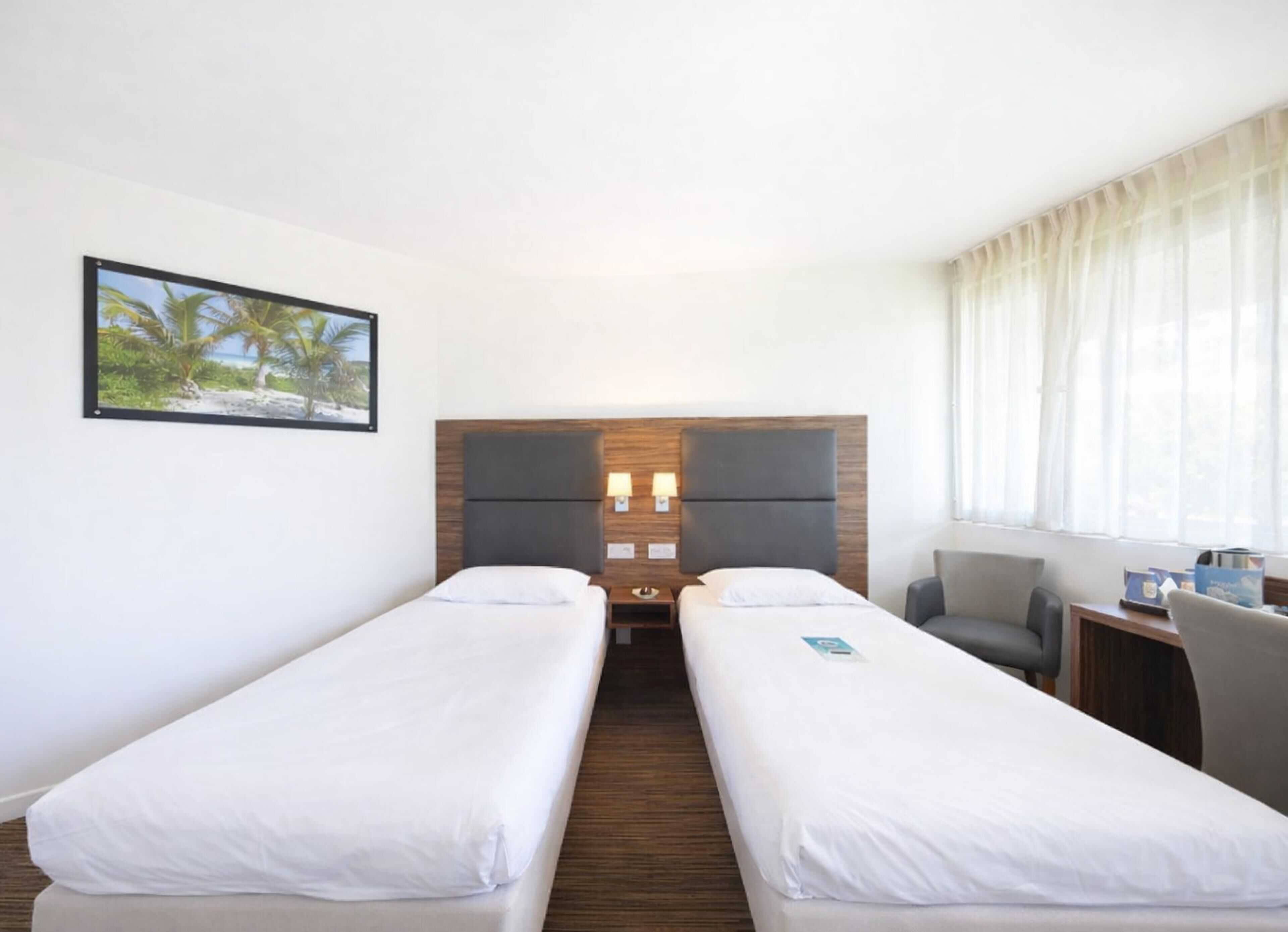 Standard Room, 2 Twin Beds | Individually furnished, desk, blackout drapes, soundproofing