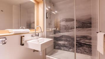 Shower, eco-friendly toiletries, hair dryer, towels