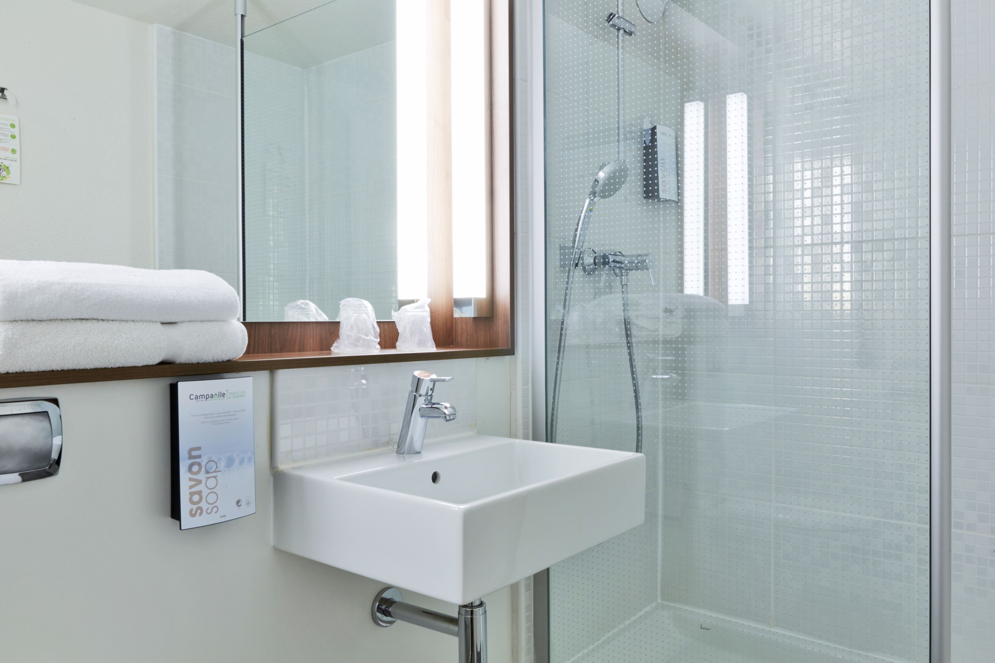 shower, eco-friendly toiletries, hair dryer, towels