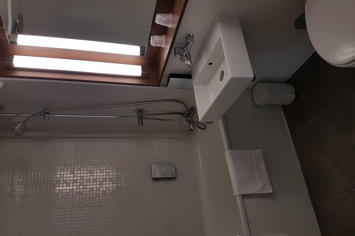 eco-friendly toiletries, hair dryer, towels