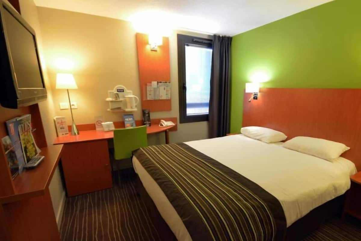 Desk, laptop workspace, blackout drapes, soundproofing