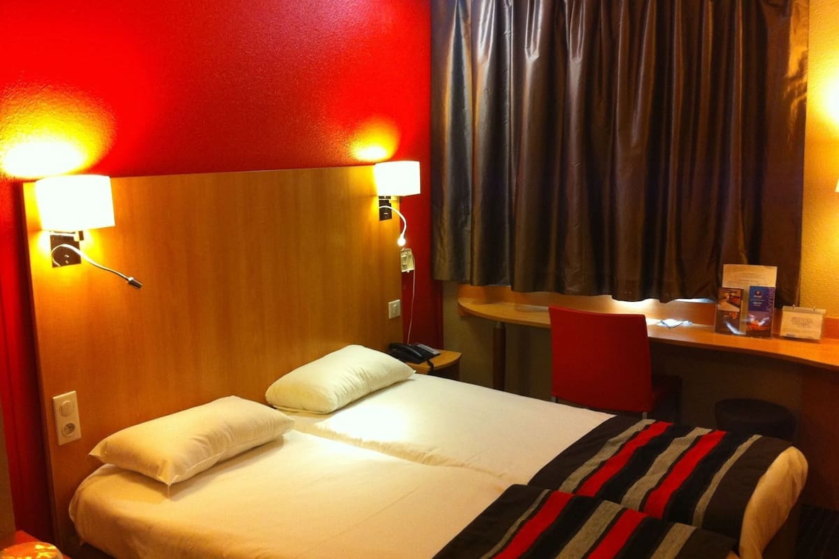 Desk, laptop workspace, blackout drapes, soundproofing