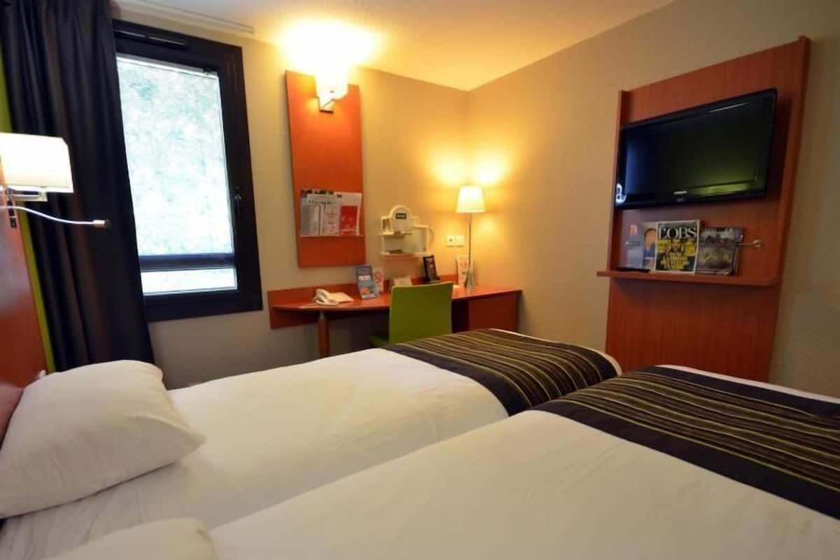 Desk, laptop workspace, blackout drapes, soundproofing