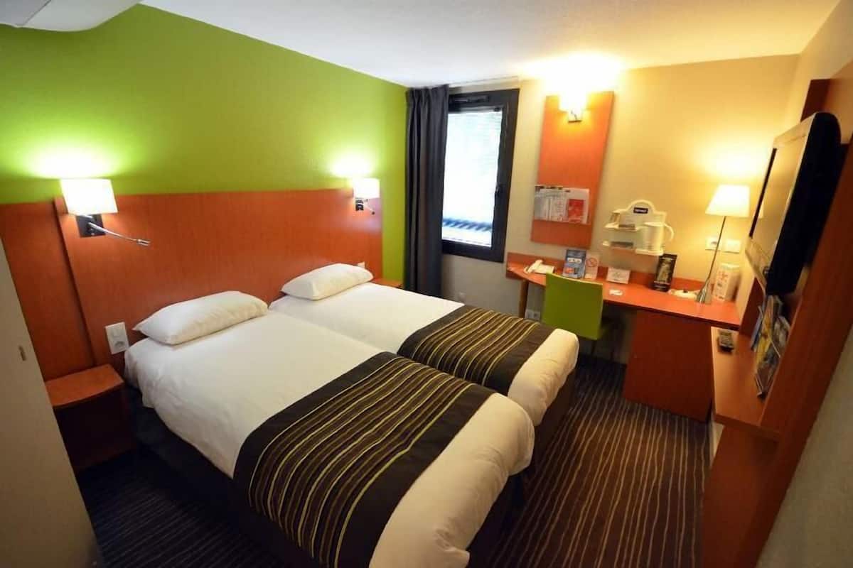 Desk, laptop workspace, blackout drapes, soundproofing