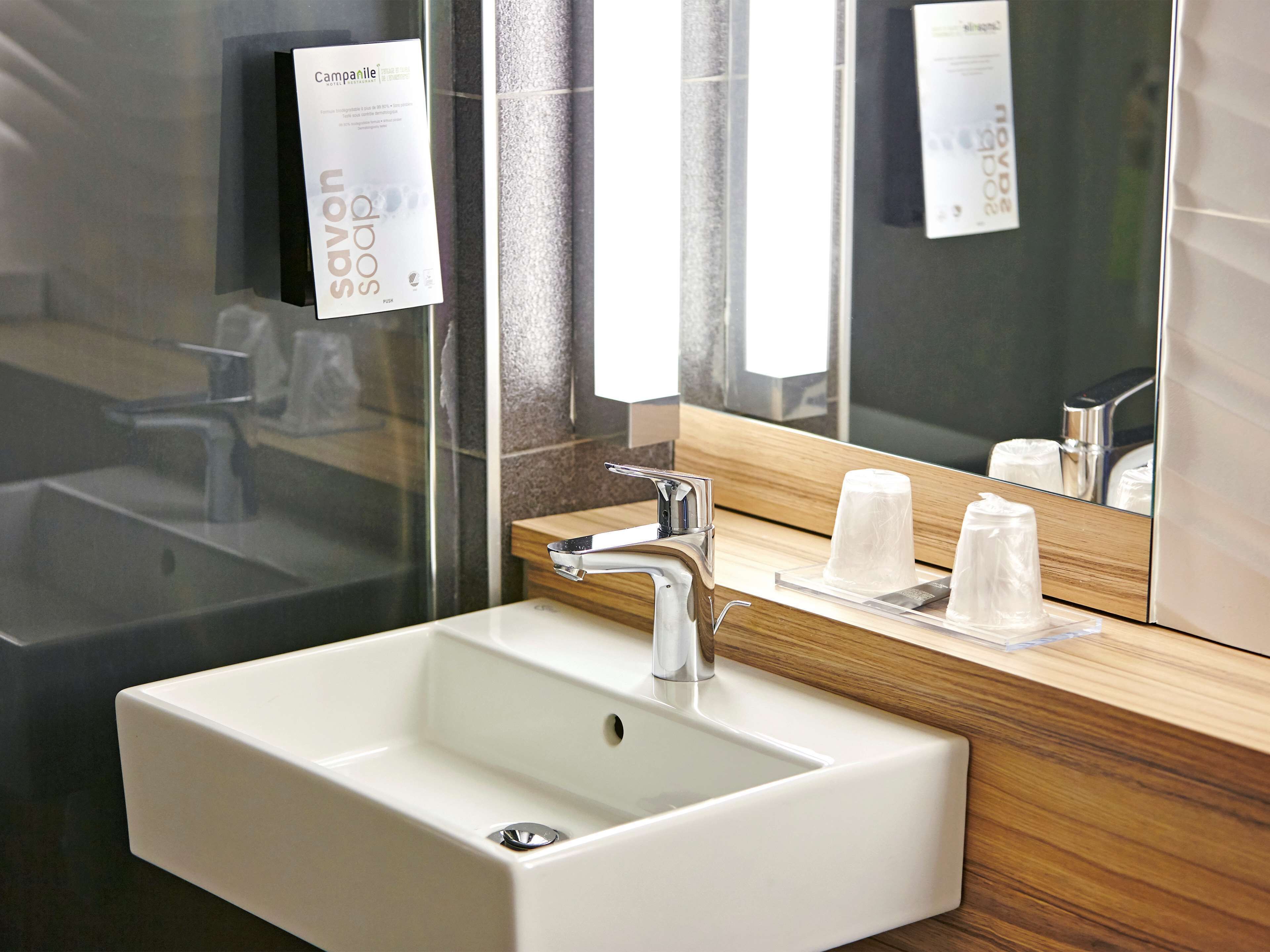 eco-friendly toiletries, hair dryer, towels