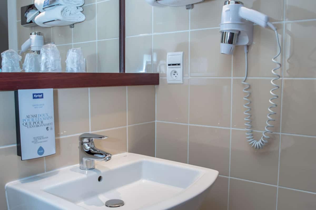 shower, eco-friendly toiletries, hair dryer, towels