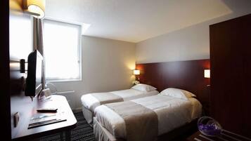 Habitación estándar, 2 camas individuales | Escritorio, sistema de insonorización, wifi gratis y ropa de cama