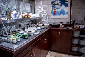 Daily buffet breakfast (EUR 14 per person)