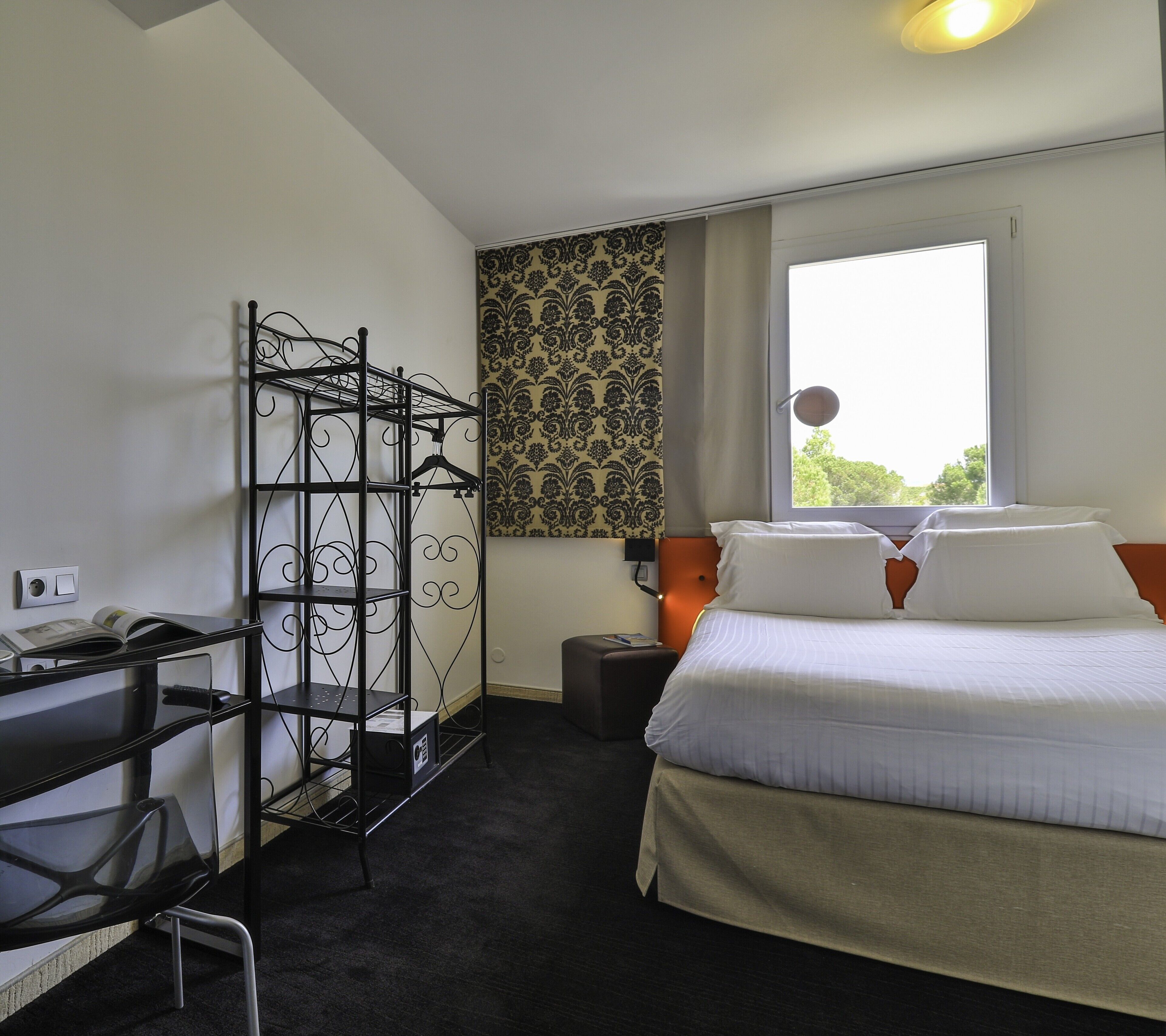 Comfort Room | Desk, laptop workspace, blackout drapes, soundproofing