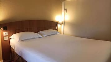 Premium bedding, desk, blackout curtains, soundproofing