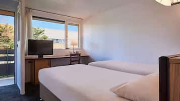 Premium bedding, desk, blackout drapes, soundproofing