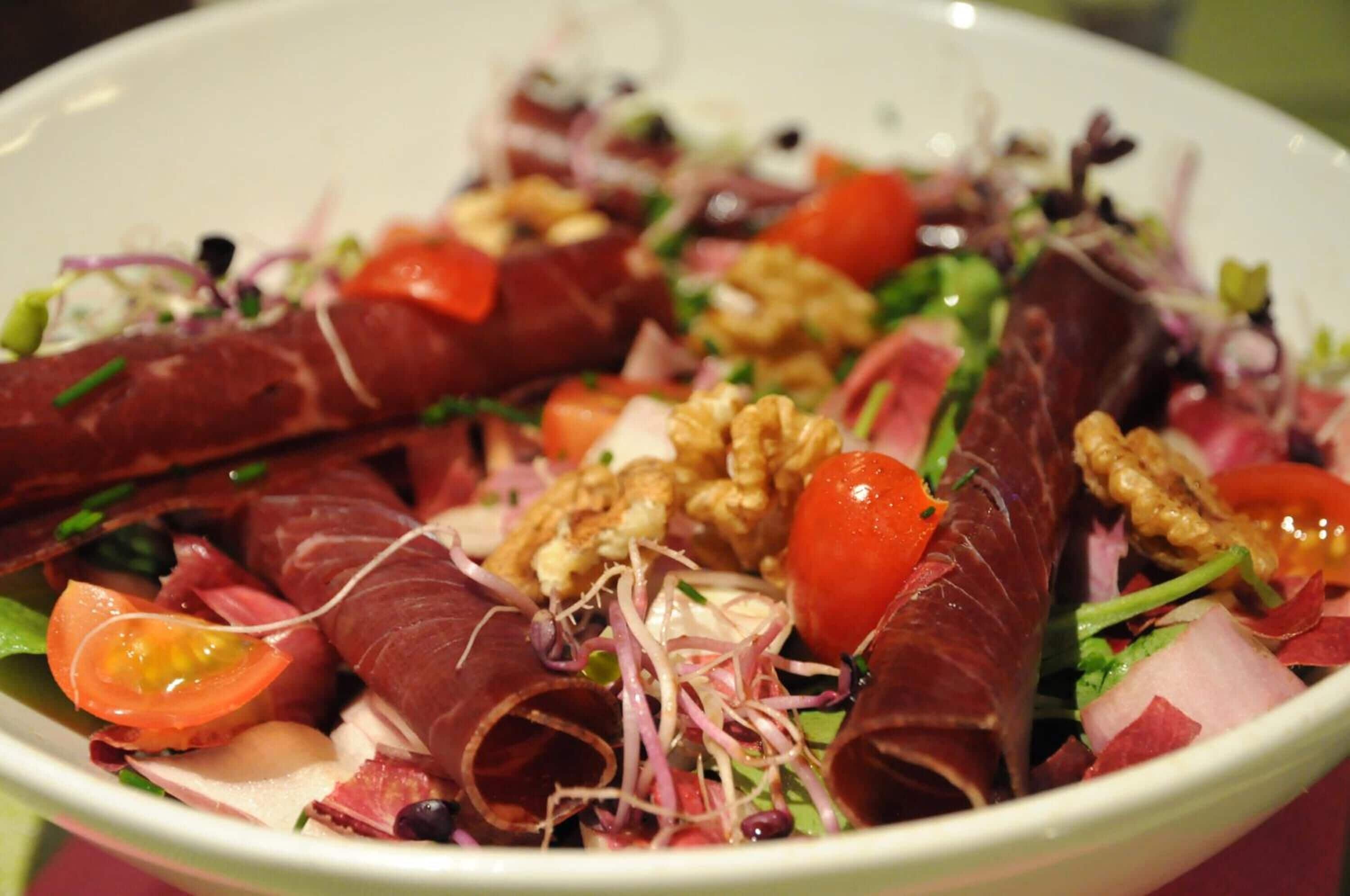 A salad with various ingredients.