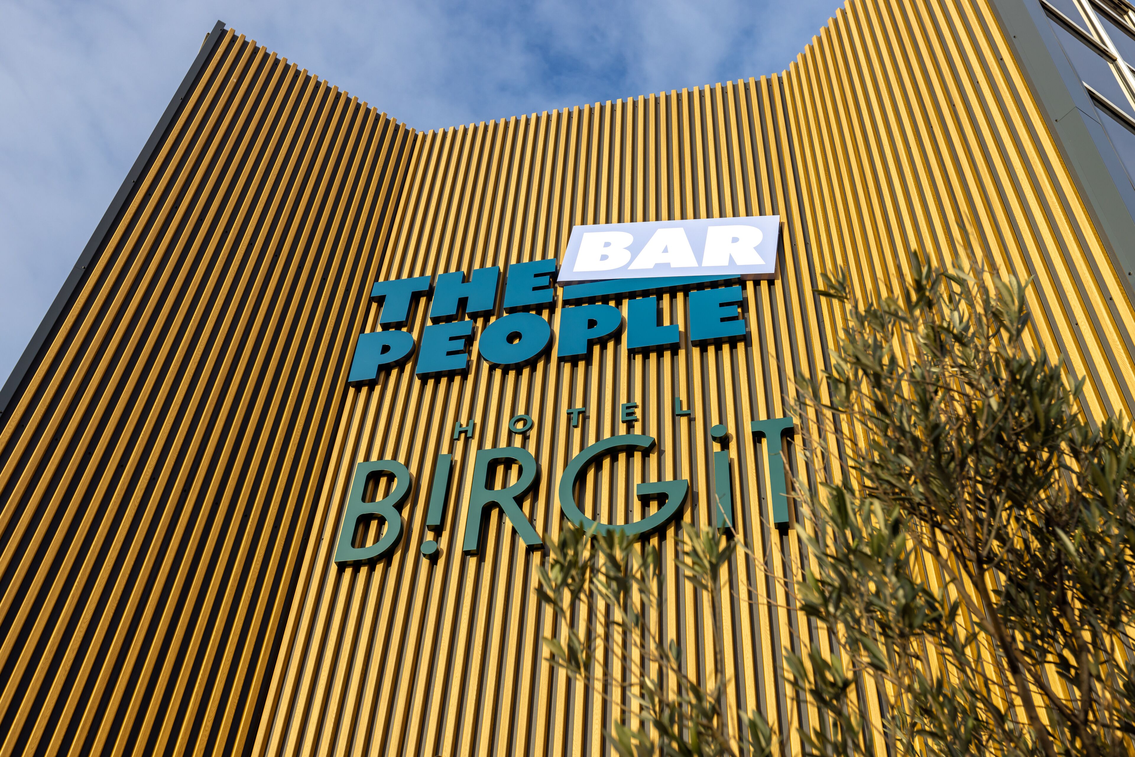 A hotel sign with the name "The People Hotel Birgit."