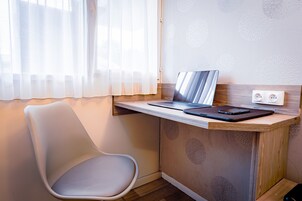 Bañera, toallas, jabón, shampoo