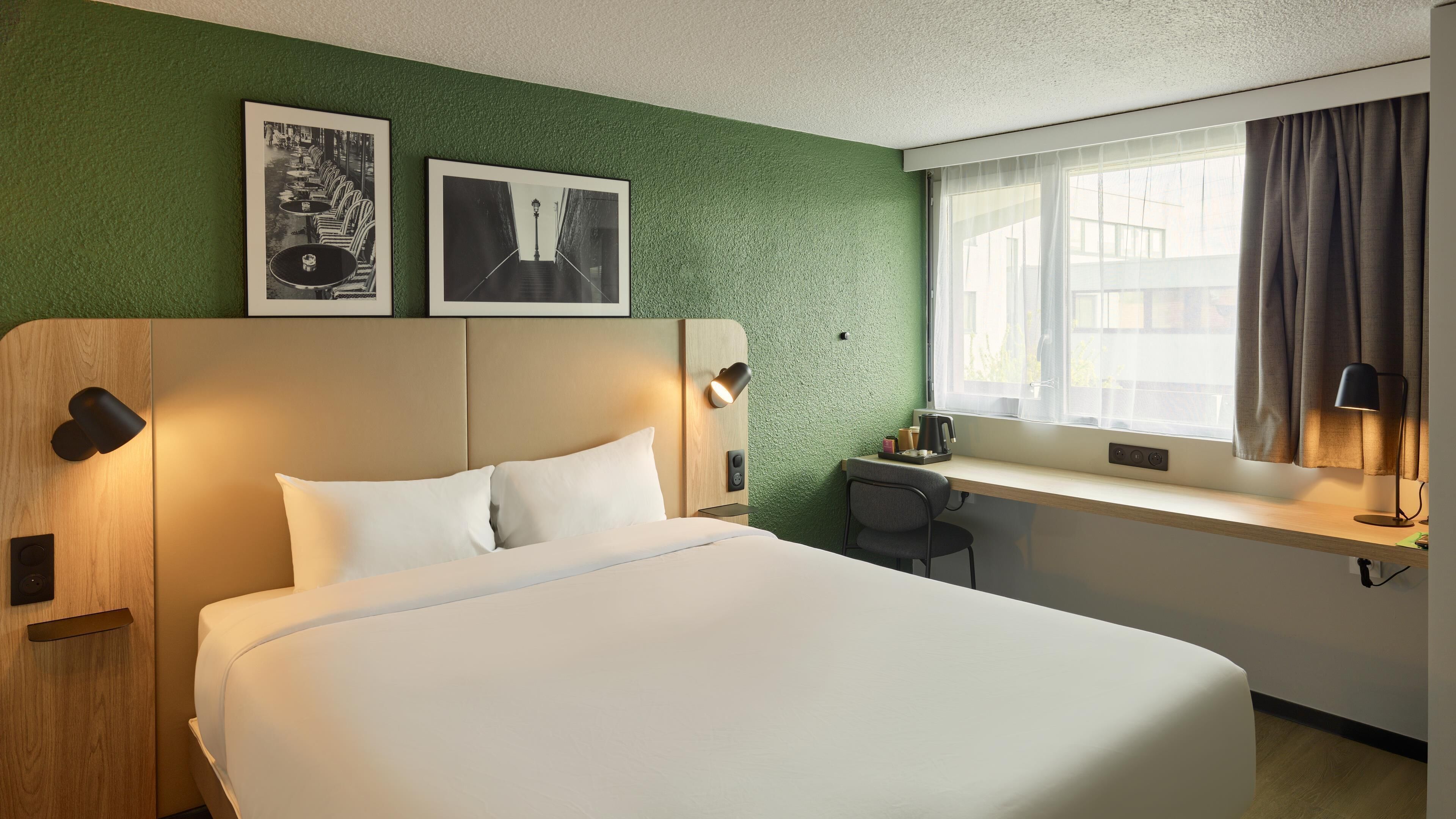 Premium bedding, desk, blackout drapes, iron/ironing board