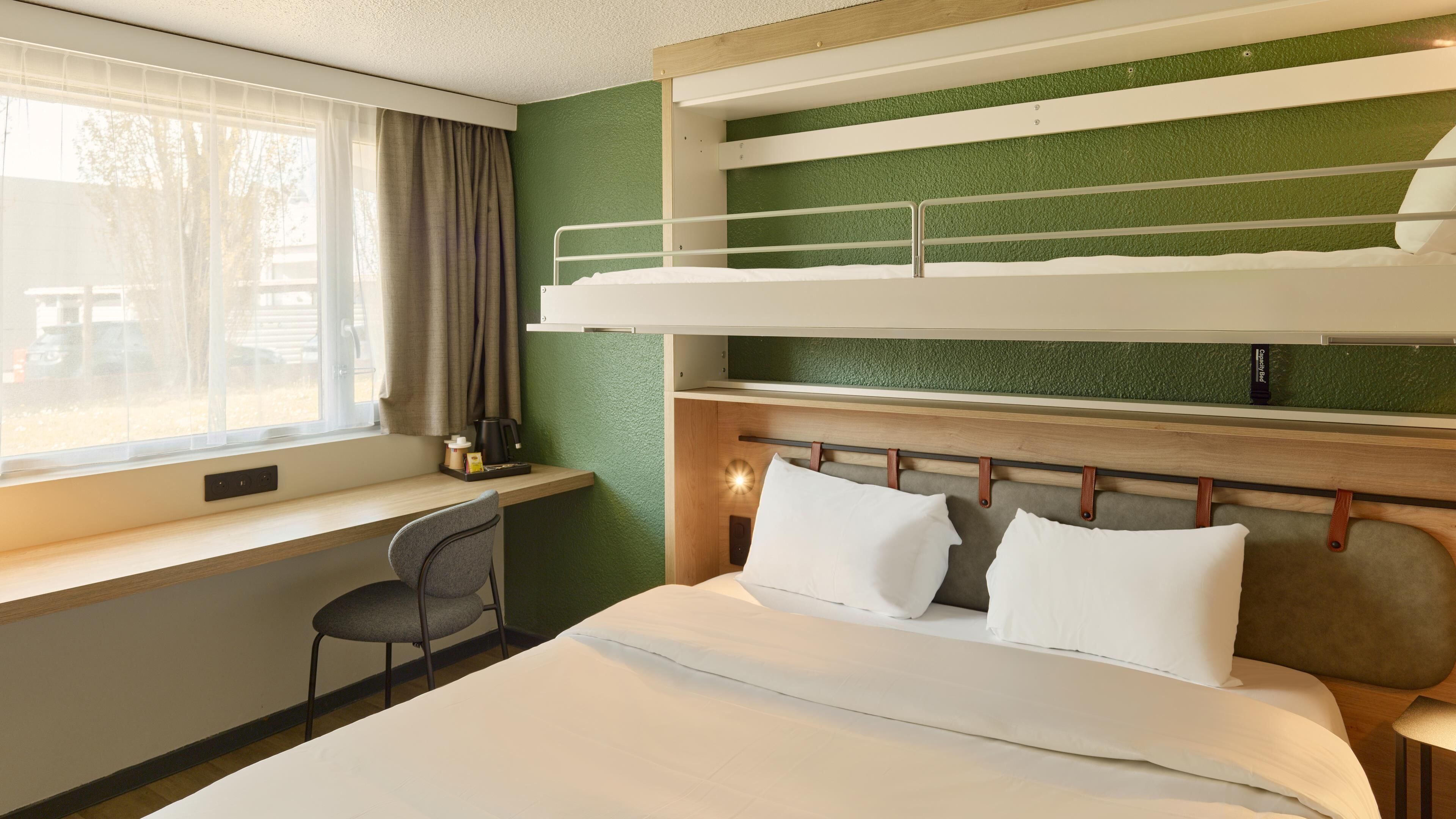 Premium bedding, desk, blackout drapes, iron/ironing board