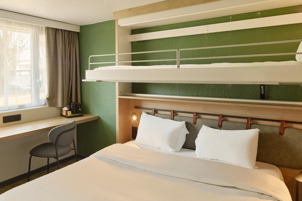 Premium bedding, desk, blackout drapes, iron/ironing board