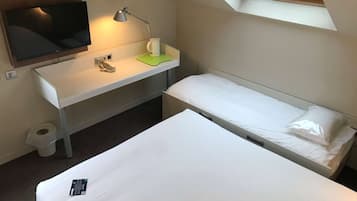 Premium bedding, desk, blackout drapes, soundproofing