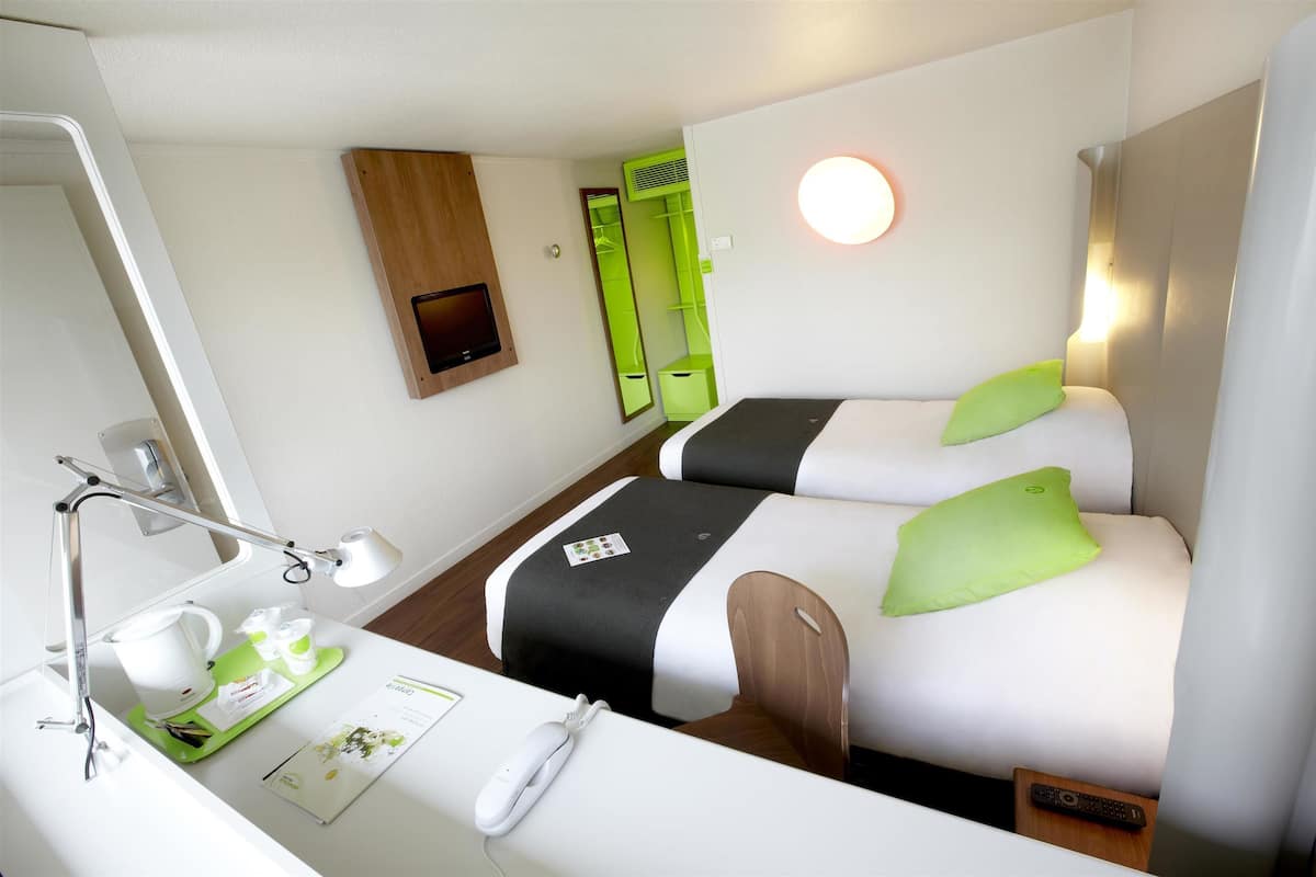 Premium bedding, desk, blackout curtains, soundproofing