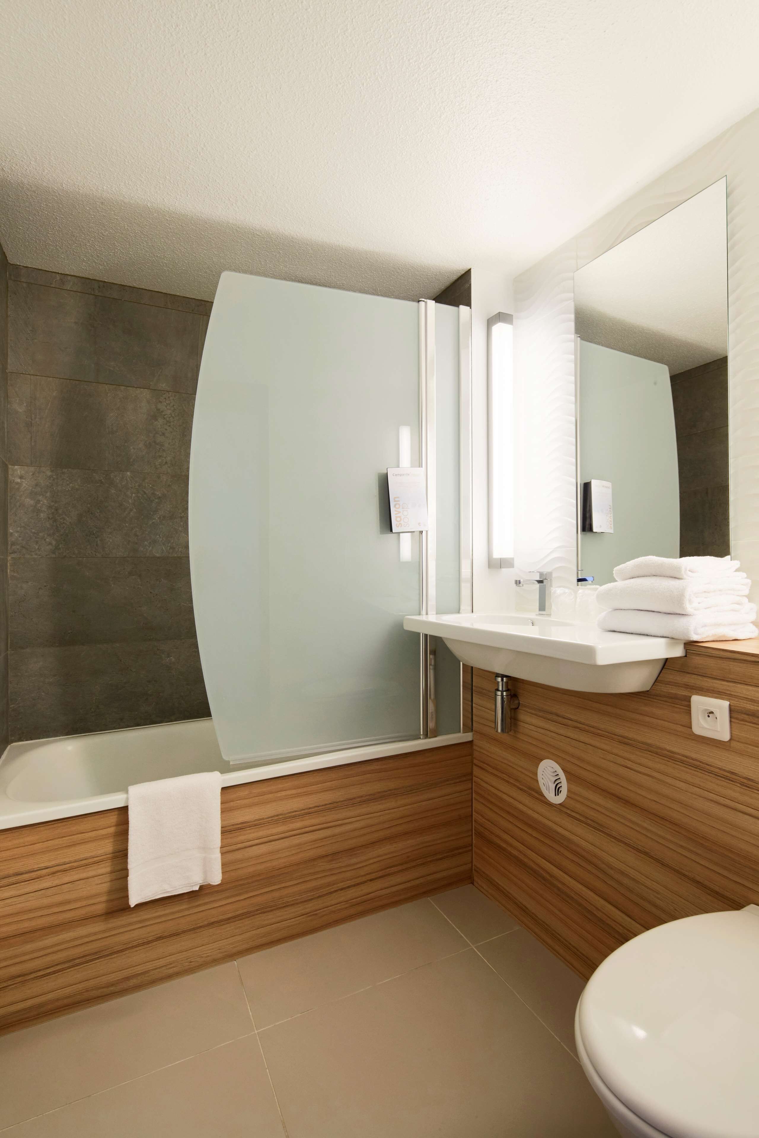 eco-friendly toiletries, hair dryer, towels