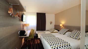 A hotel room with two beds, a desk with a chair, a TV, and a coat rack.