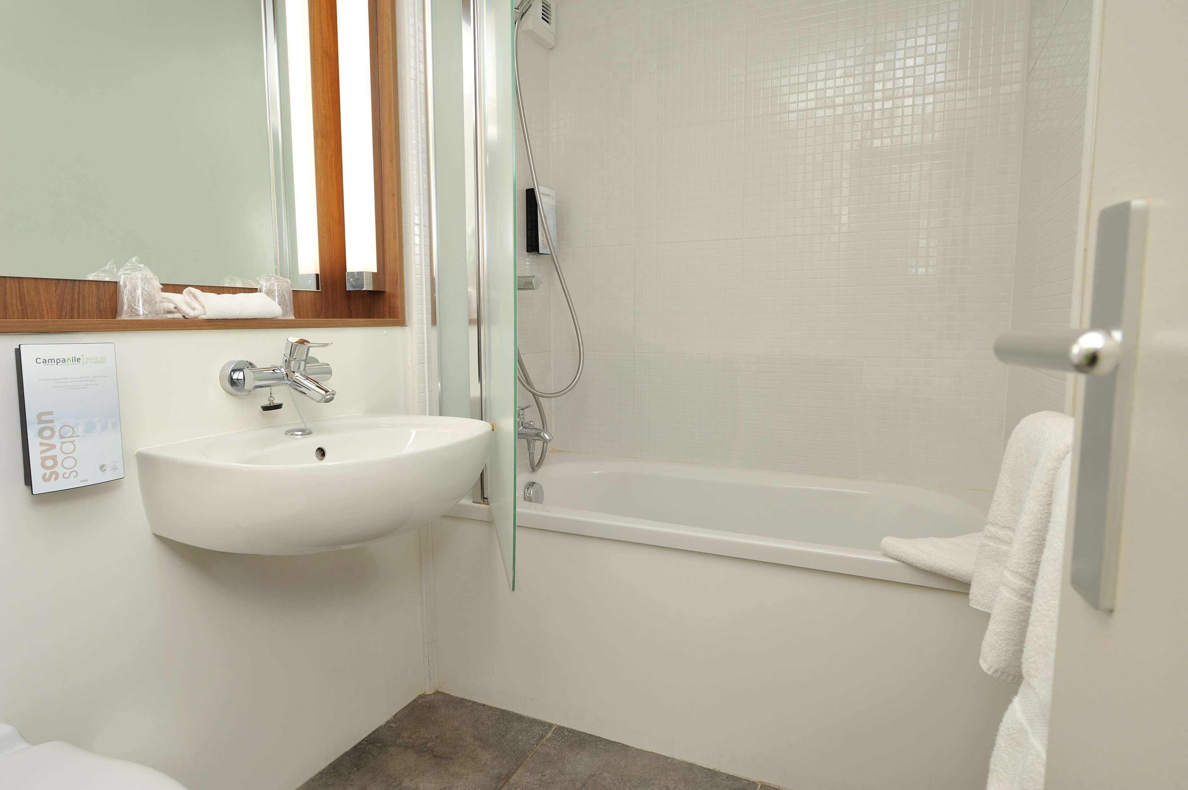 eco-friendly toiletries, hair dryer, towels