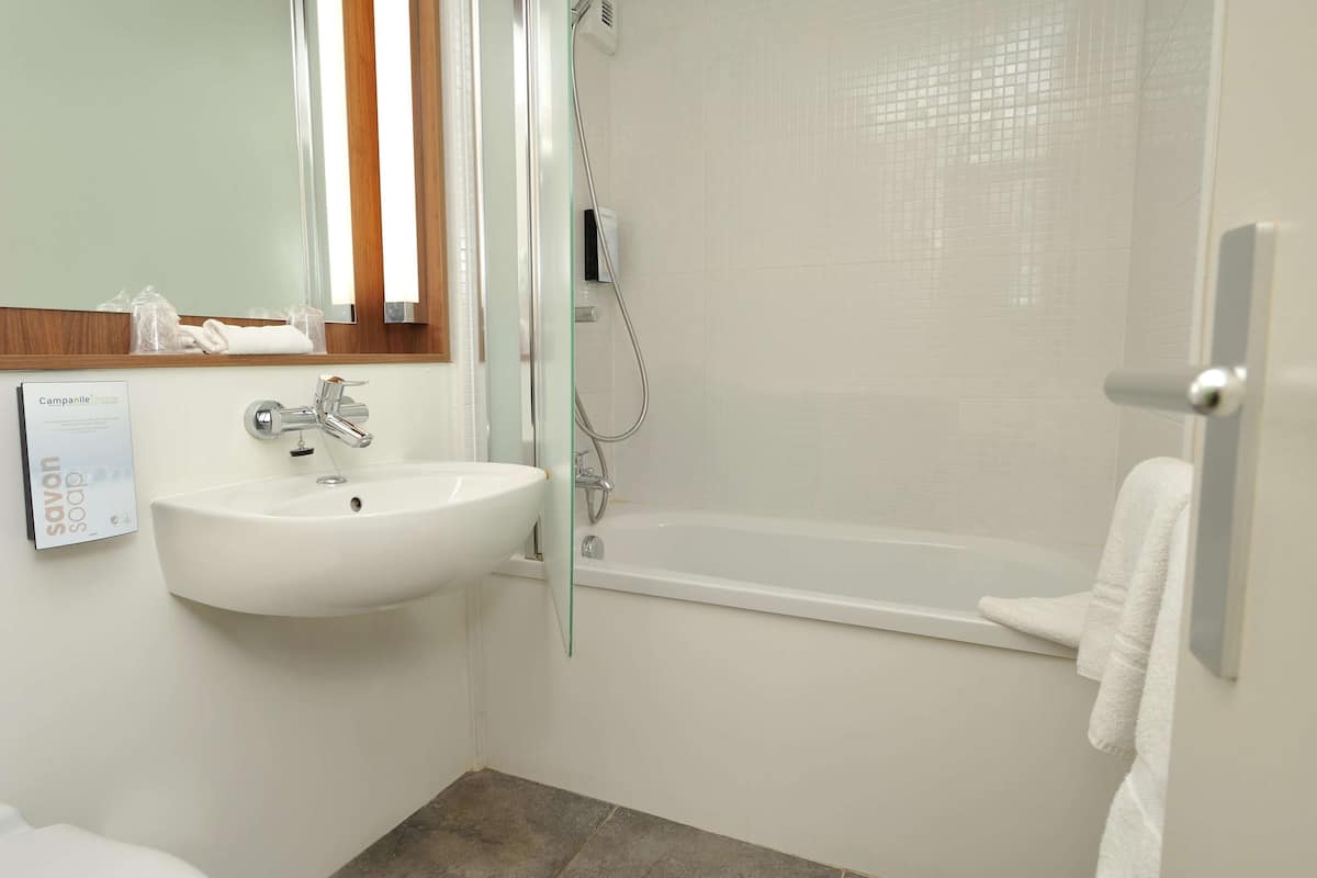 eco-friendly toiletries, hair dryer, towels