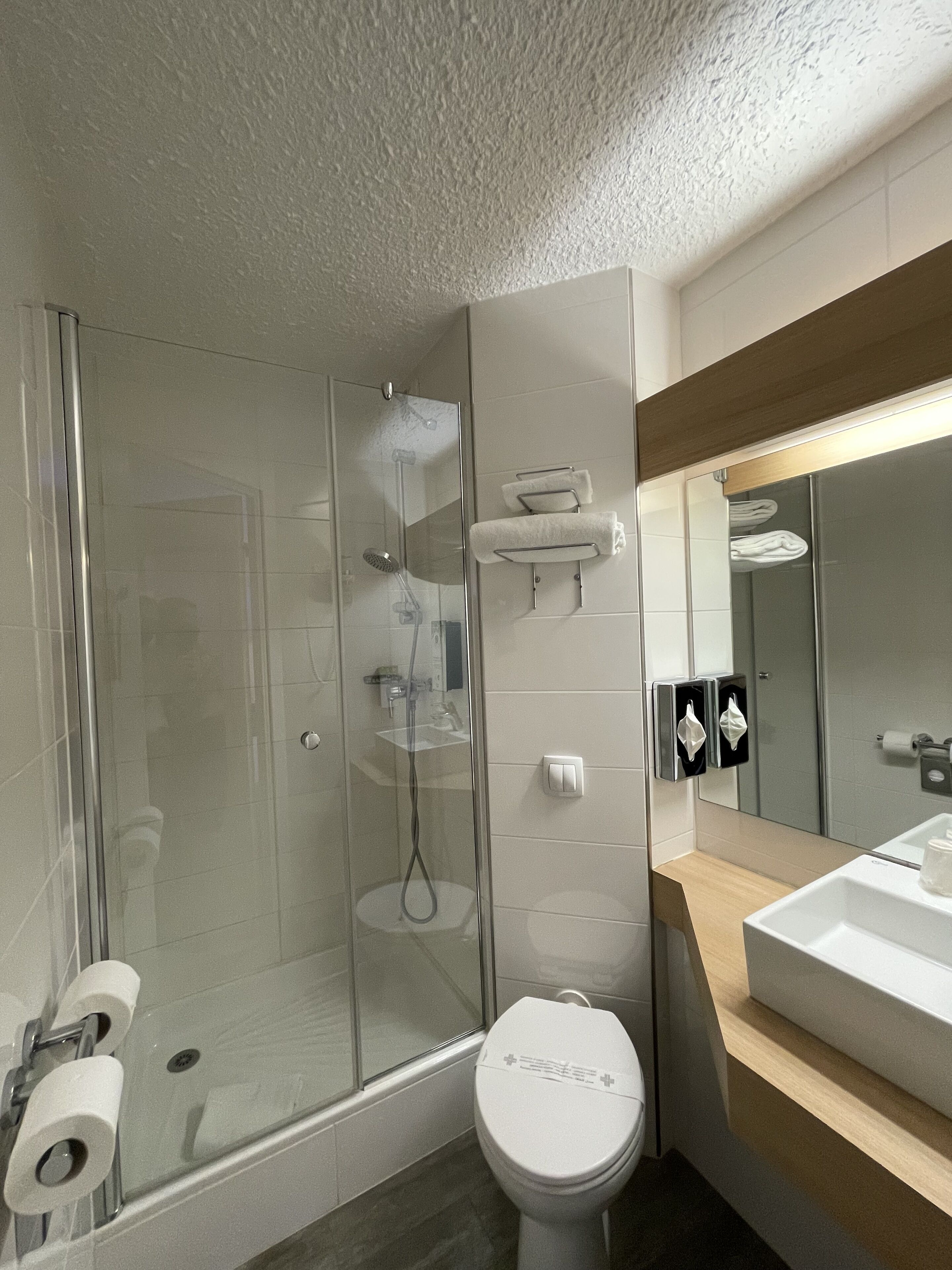 shower, eco-friendly toiletries, hair dryer, towels