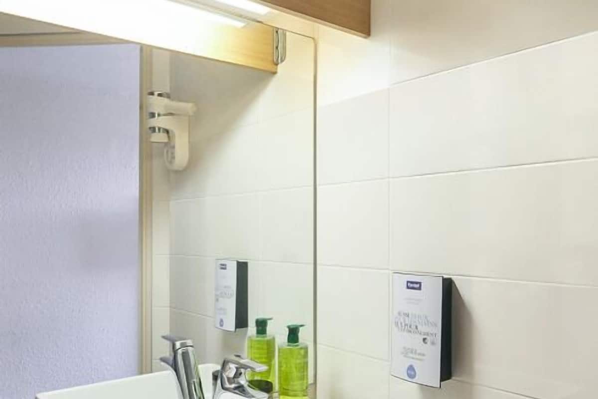 shower, eco-friendly toiletries, hair dryer, towels