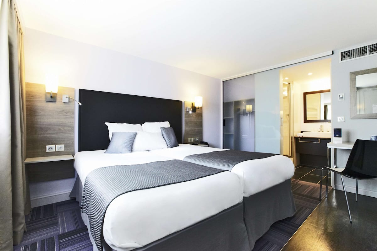 Premium bedding, in-room safe, individually decorated, desk