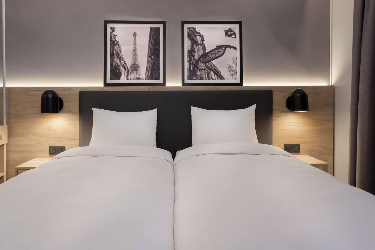 Premium bedding, desk, blackout drapes, iron/ironing board