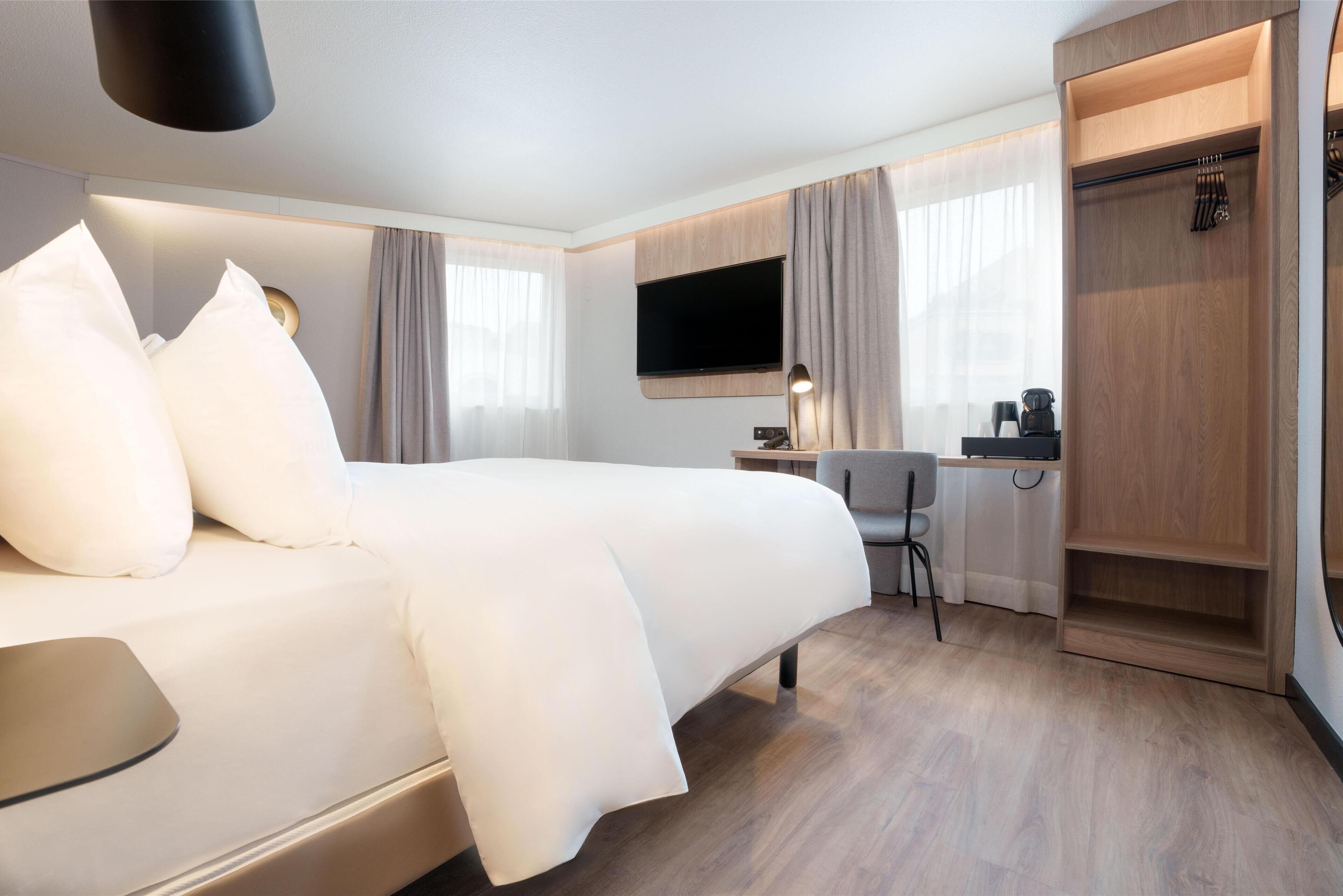 superior room, 1 king bed | premium bedding, desk, blackout curtains, iron/ironing board