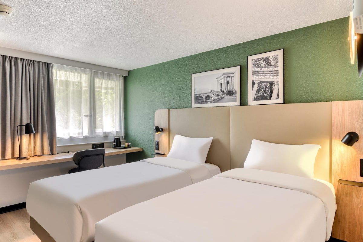 Premium bedding, desk, blackout curtains, iron/ironing board