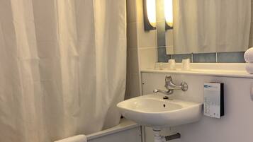 Eco-friendly toiletries, hair dryer, towels