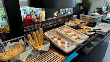 Daily buffet breakfast (EUR 12.9 per person)