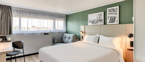 Premium bedding, desk, blackout drapes, iron/ironing board