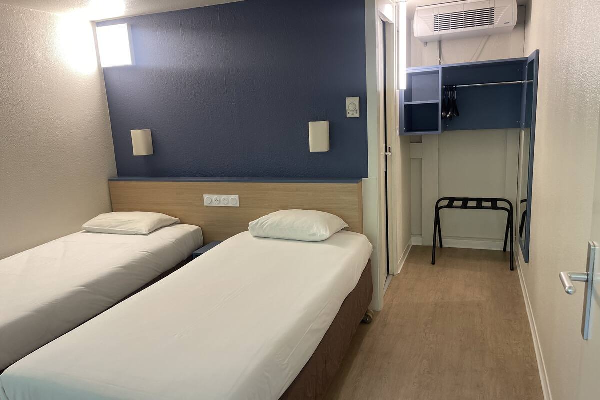 Desk, laptop workspace, blackout curtains, free WiFi