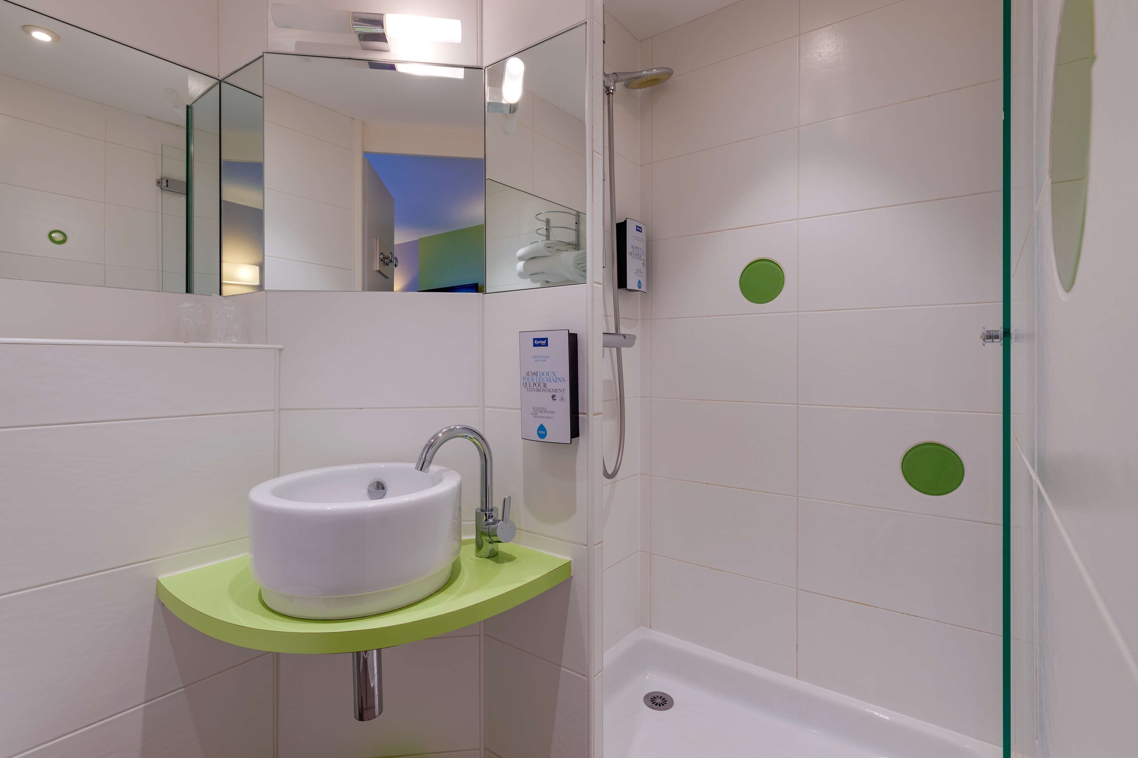 eco-friendly toiletries, hair dryer, towels